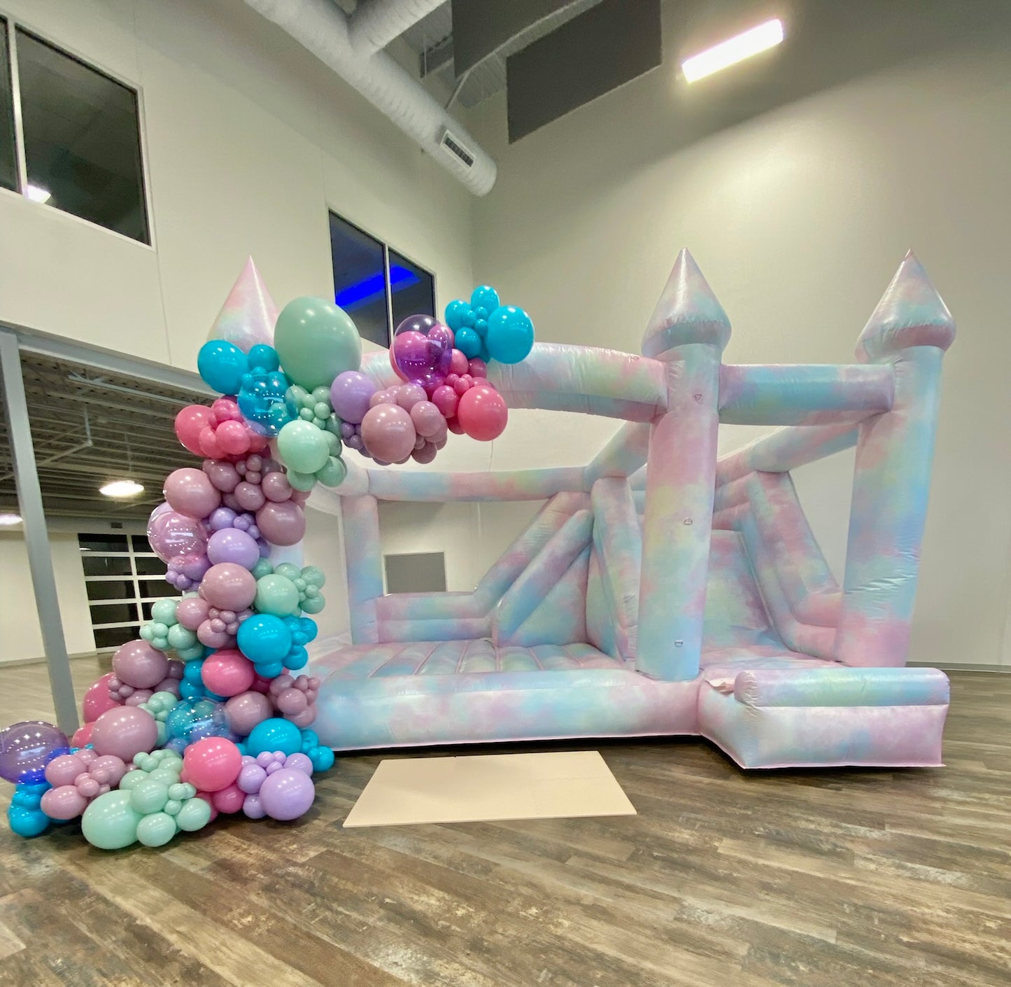 Check it out! The ultimate modern tie dye bounce house and slide is ready to take your celebration to the next level! Serving the heart of Dallas Fort Worth, TX, this is the perfect addition to any event.