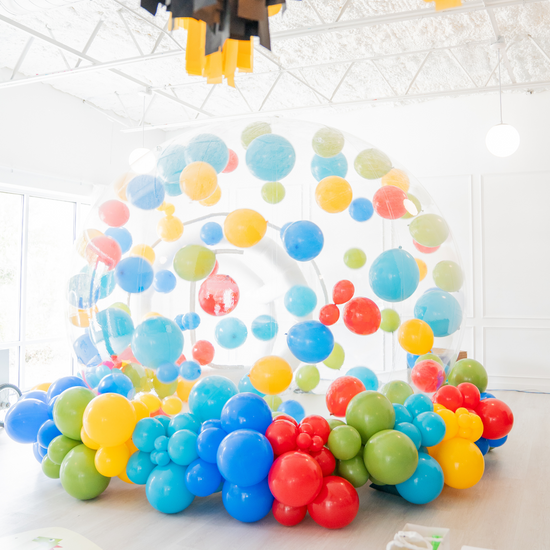 Dallas and Fort Worth preferred bounce houses. White bounce house rental, modern bounce house rental, slide bounce houses, toddler bounce house, bubble house, kids seating, and party furniture.