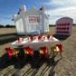 Modern minimalist white bounce house "The Opal" featuring dual inflatable slides and mesh netting for visible play - DFW Confetti Bounce
