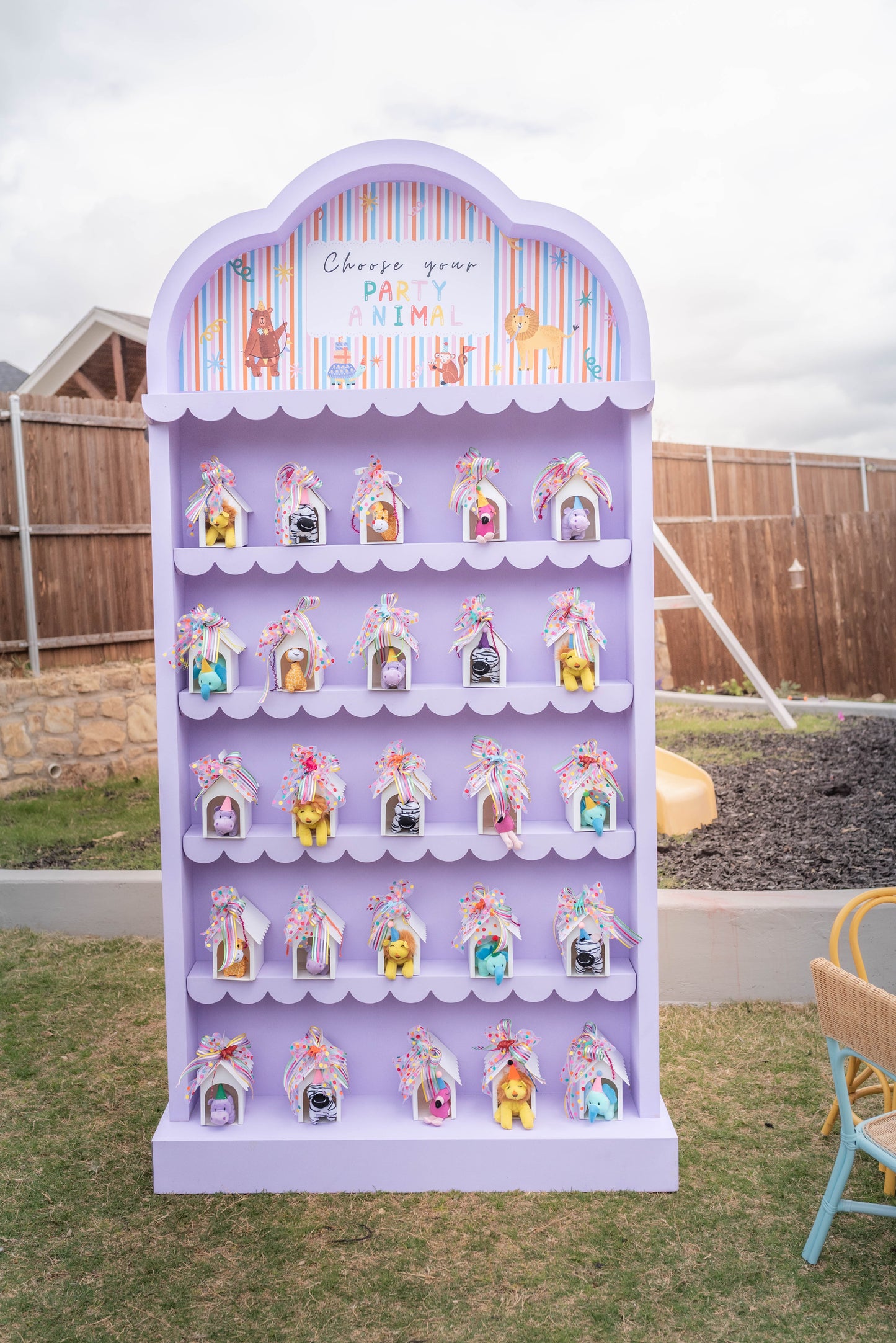 White Funfetti bookshelf favor wall display for baby shower book collections and birthday party favors in Dallas-Fort Worth - DFW Confetti Bounce